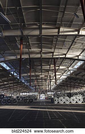 Picture - Metal rolls in warehouse. Fotosearch