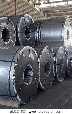Metal rolls in warehouse View Large Photo Image Stock Image - Metal rolls in warehouse. Fotosearch