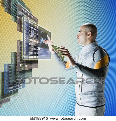 Middle eastern businessman working at futuristic control panels View Large Photo Image Stock Photography - Middle eastern businessman working at futuristic control panels. Fotosearch