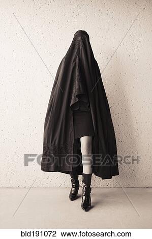 Middle Eastern woman in burka and high heeled boots View Large Photo Image Stock Image - Middle Eastern woman in burka and high heeled boots. Fotosearch