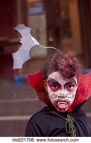 Mixed race girl wearing vampire costume View Large Photo Image Stock Photo - Mixed race girl wearing vampire costume. Fotosearch