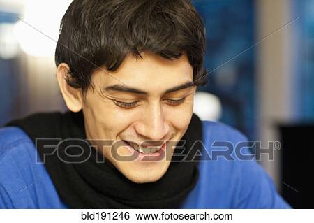 Mixed race man smiling View Large Photo Image Stock Photograph - Mixed race man smiling. Fotosearch