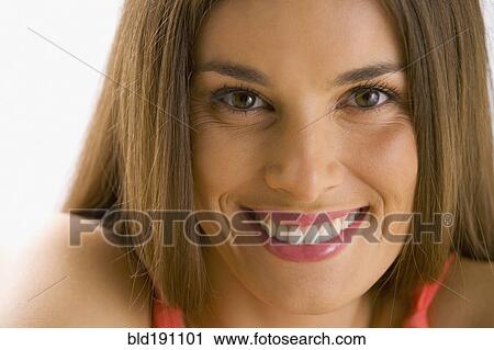 Stock Image - Mixed race woman smiling. Fotosearch