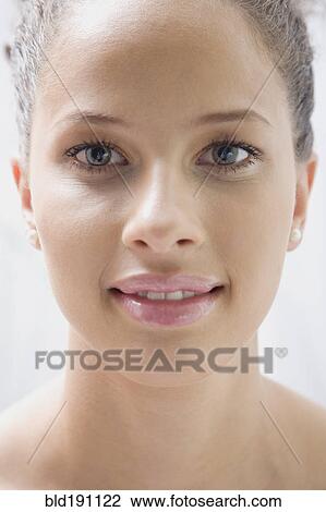Mixed race woman smiling View Large Photo Image Stock Image - Mixed race woman smiling. Fotosearch