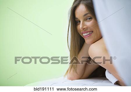 Mixed race woman waiting for spa treatment View Large Photo Image Stock Image - Mixed race woman waiting for spa treatment. Fotosearch