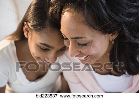 Mother and daughter laughing View Large Photo Image Stock Photo - Mother and daughter laughing. Fotosearch