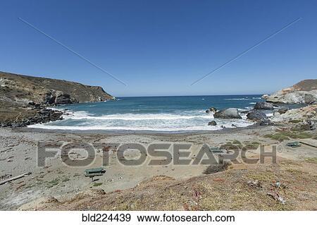 Ocean waves at beach cove View Large Photo Image Stock Photo - Ocean waves at beach cove. Fotosearch
