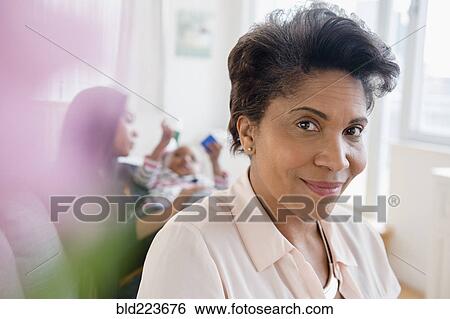 Stock Photograph - Older Black woman smiling. Fotosearch