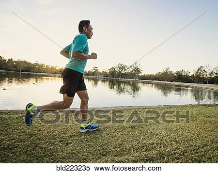 Older Chinese man running in park View Large Photo Image Stock Photography - Older Chinese man running in park. Fotosearch