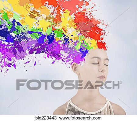 Stock Image - Paint splatter exploding from head of Mixed Race girl. Fotosearch
