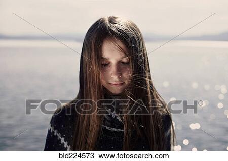 Pensive Caucasian girl at lake View Large Photo Image Stock Image - Pensive Caucasian girl at lake. Fotosearch