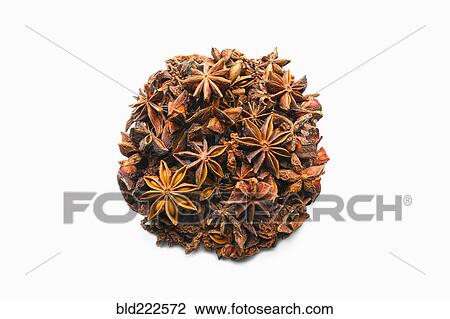 Stock Image - Pile of brown seasoning in shape of a circle. Fotosearch