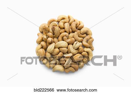 Stock Photograph - Pile of cashews in shape of a circle. Fotosearch