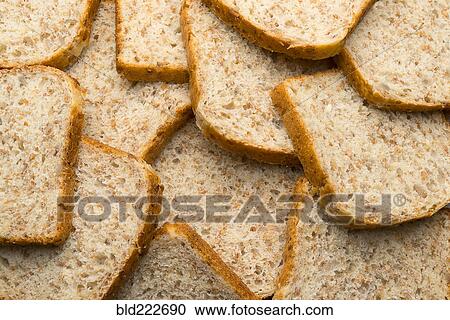 Stock Image - Pile of fresh bread slices. Fotosearch