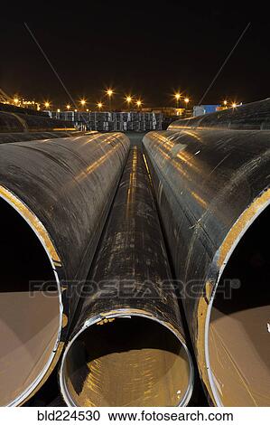 Pile of large pipes View Large Photo Image Stock Image - Pile of large pipes. Fotosearch
