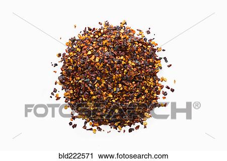 Stock Image - Pile of pepper flakes in shape of a circle. Fotosearch