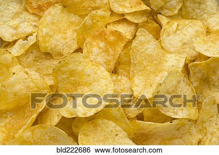 Stock Photograph - Pile of potato chips. Fotosearch