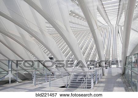Stock Photo - Pillars and staircase in modern train station. Fotosearch