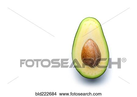Picture - Pit in sliced avocado. Fotosearch