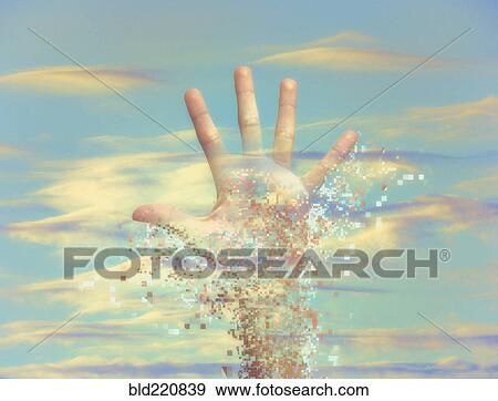 Stock Photo - Pixelated hand dissolving in sky. Fotosearch