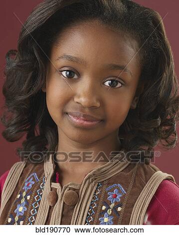 Stock Image - Portrait of mixed race girl. Fotosearch