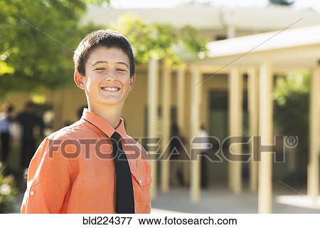 Proud Caucasian boy posing outdoors View Large Photo Image Stock Photo - Proud Caucasian boy posing outdoors. Fotosearch