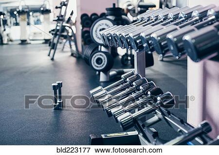 Rack of dumbbells in gym View Large Photo Image Stock Photo - Rack of dumbbells in gym. Fotosearch