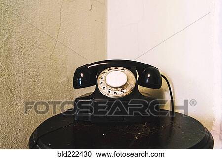 Retro landline telephone on table in corner View Large Photo Image Stock Image - Retro landline telephone on table in corner. Fotosearch