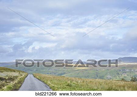 Stock Photograph - Road in rural landscape. Fotosearch