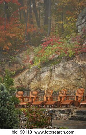 Stock Photo - Row of deck chairs at spa. Fotosearch