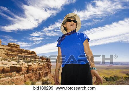 Senior Asian woman in desert View Large Photo Image Stock Photo - Senior Asian woman in desert. Fotosearch