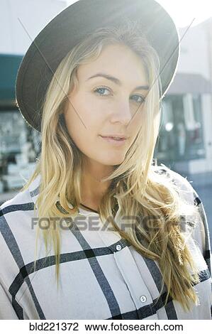 Stock Image - Serious Caucasian woman outdoors. Fotosearch