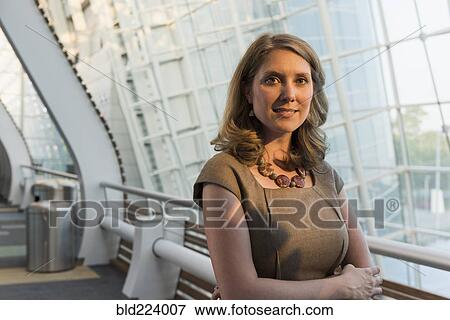 Smiling Caucasian businesswoman View Large Photo Image Stock Photo - Smiling Caucasian businesswoman. Fotosearch