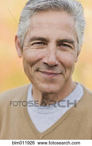 Stock Photograph - Smiling Caucasian man. Fotosearch