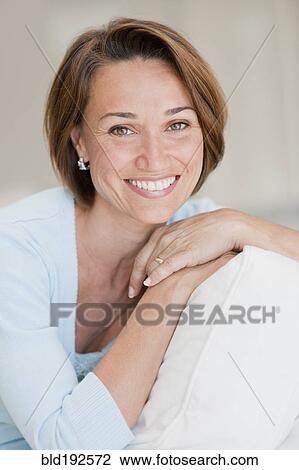 Stock Image - Smiling Hispanic woman. Fotosearch