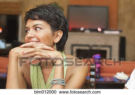 Stock Image - Smiling Hispanic woman. Fotosearch