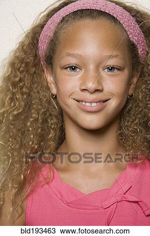 Smiling mixed race girl View Large Photo Image Stock Image - Smiling mixed race girl. Fotosearch