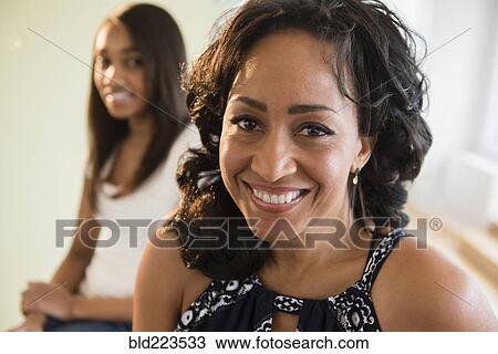 Smiling mother and daughter View Large Photo Image Stock Image - Smiling mother and daughter . Fotosearch