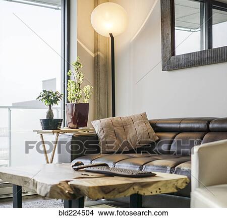 Picture - Sofa and armchair near livingroom window. Fotosearch