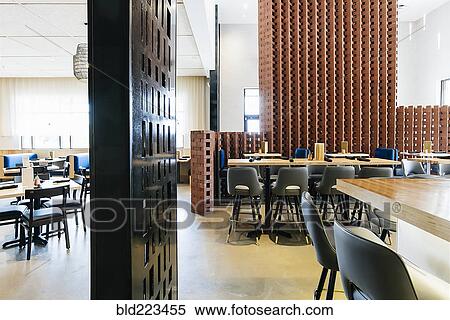 Stock Photography - Tables and chairs in modern bar and restaurant. Fotosearch