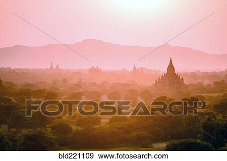 Towers in misty landscape View Large Photo Image Stock Photo - Towers in misty landscape. Fotosearch