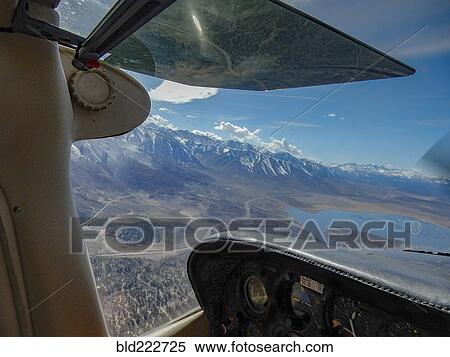 "View of lake and mountains from cockpit, Bishop, California, United States, " View Large Photo Image Stock Photography - "View of lake and mountains from cockpit, Bishop, California, United States, ". Fotosearch