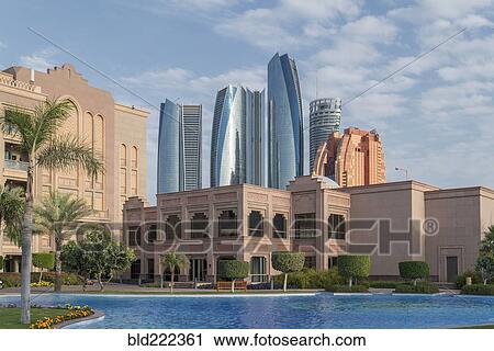 Stock Image - "Waterfront near modern highrises, Abu Dhabi, Abu Dhabi Emirate, United Arab Emirates, ". Fotosearch