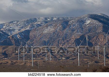 Wind turbines near mountain View Large Photo Image Stock Photo - Wind turbines near mountain. Fotosearch