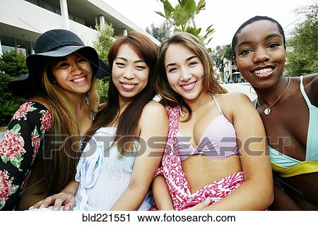Stock Image - Women smiling outdoors. Fotosearch