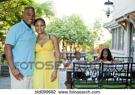 African American family enjoying patio View Large Photo Image Stock Image - African American family enjoying patio. Fotosearch