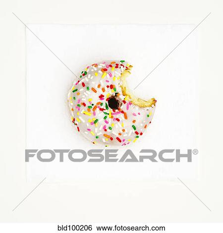 Bite taken out of frosted donut View Large Photo Image Stock Photograph - Bite taken out of frosted donut. Fotosearch