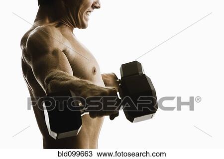 Caucasian man lifting weights View Large Photo Image Stock Image - Caucasian man lifting weights. Fotosearch