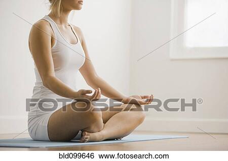 Caucasian woman practicing yoga View Large Photo Image Stock Photograph - Caucasian woman practicing yoga. Fotosearch