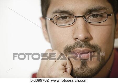Close up of businessman with beard wearing eyeglasses View Large Photo Image Stock Image - Close up of businessman with beard wearing eyeglasses. Fotosearch